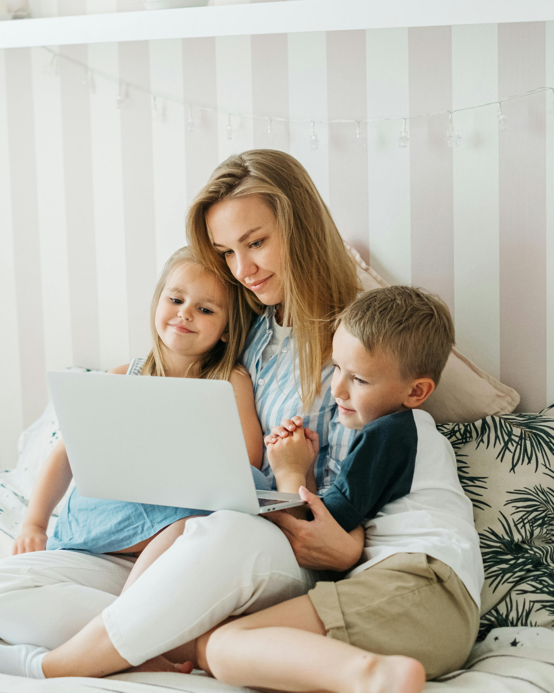 Family using laptop at home